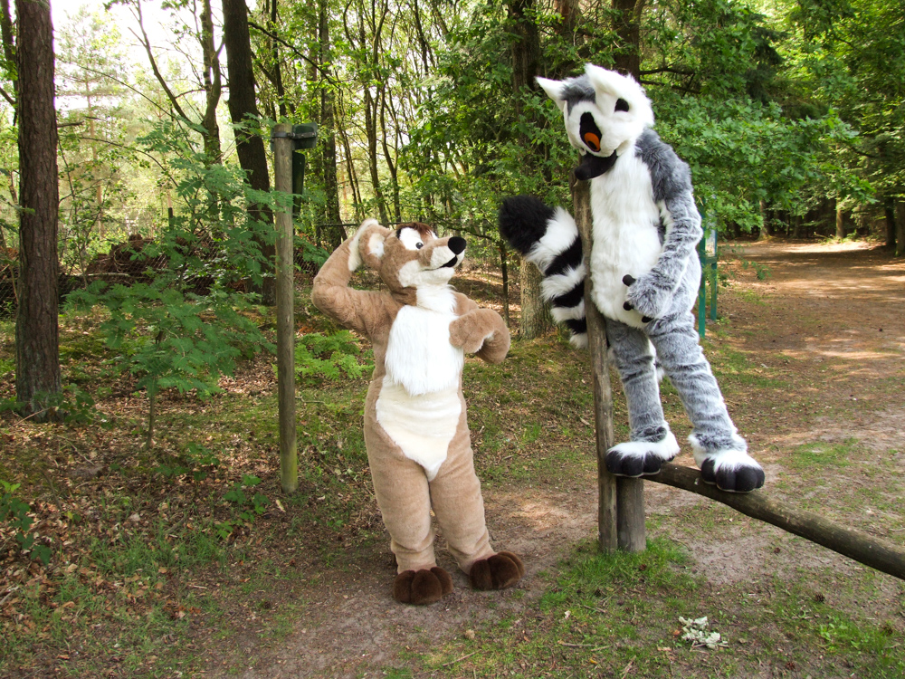 Tyler and Kiki posing in the forest