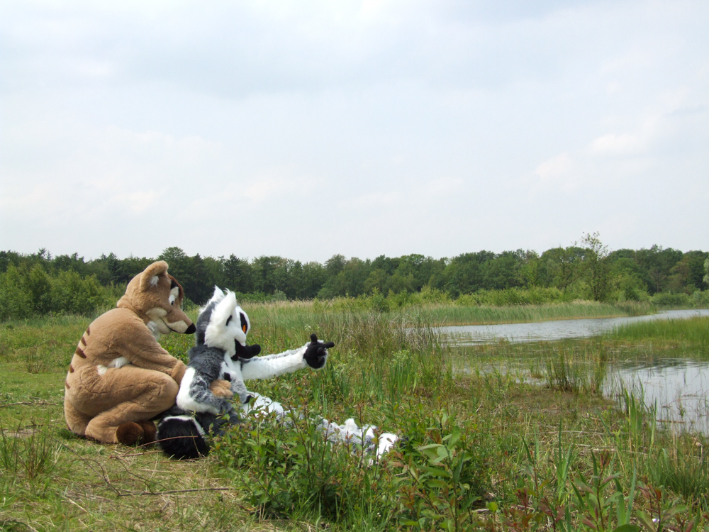 Tyler and Kiki sitting at a lake