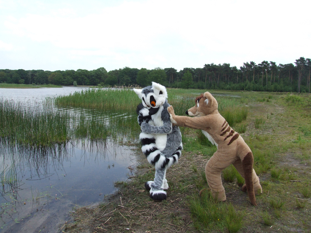 Tyler, pretending to push Kiki into the lake