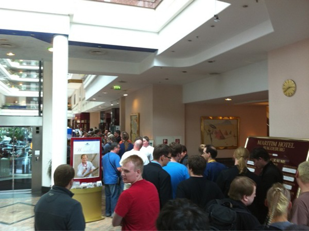 A long waiting line for the convention registration in the lobby of the Maritim Hotel