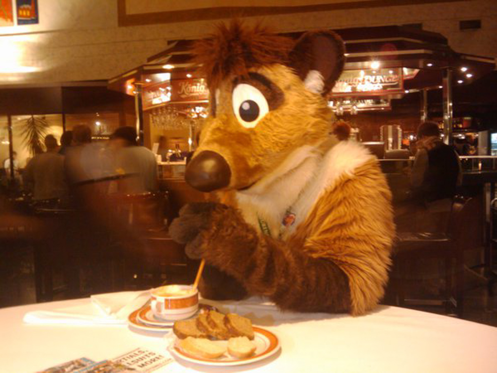 Titash drinking soup through a straw