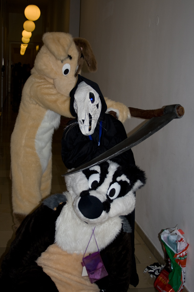 Dog, a skeleton rat and Eddie posing for a photo