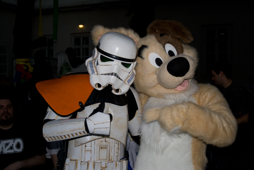 Dog posing with a storm trooper