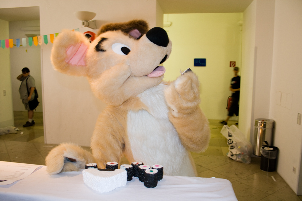 Dog eating some styrofoam sushi props