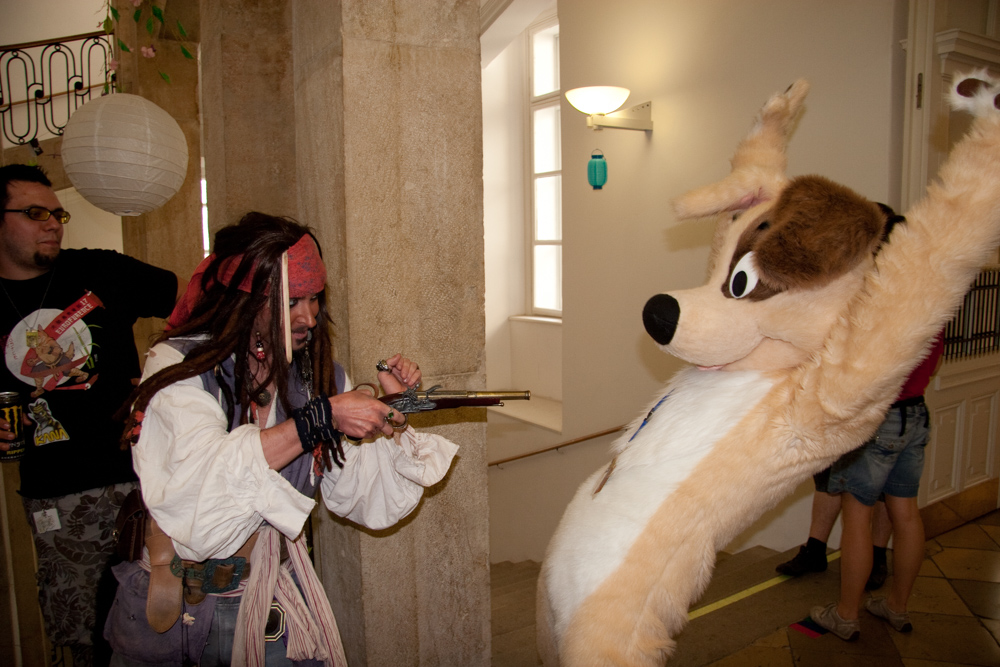 Jack Sparrow pointing a gun at [Dog](https://www.furaffinity.net/user/dogthedog)