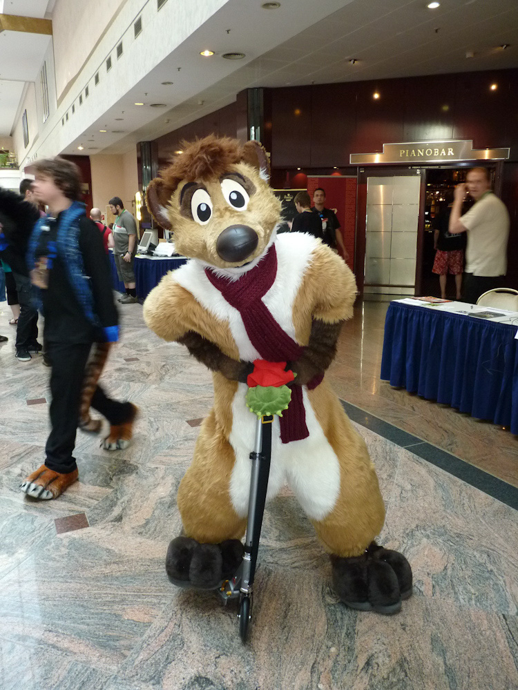 Titash on his little stepping scooter