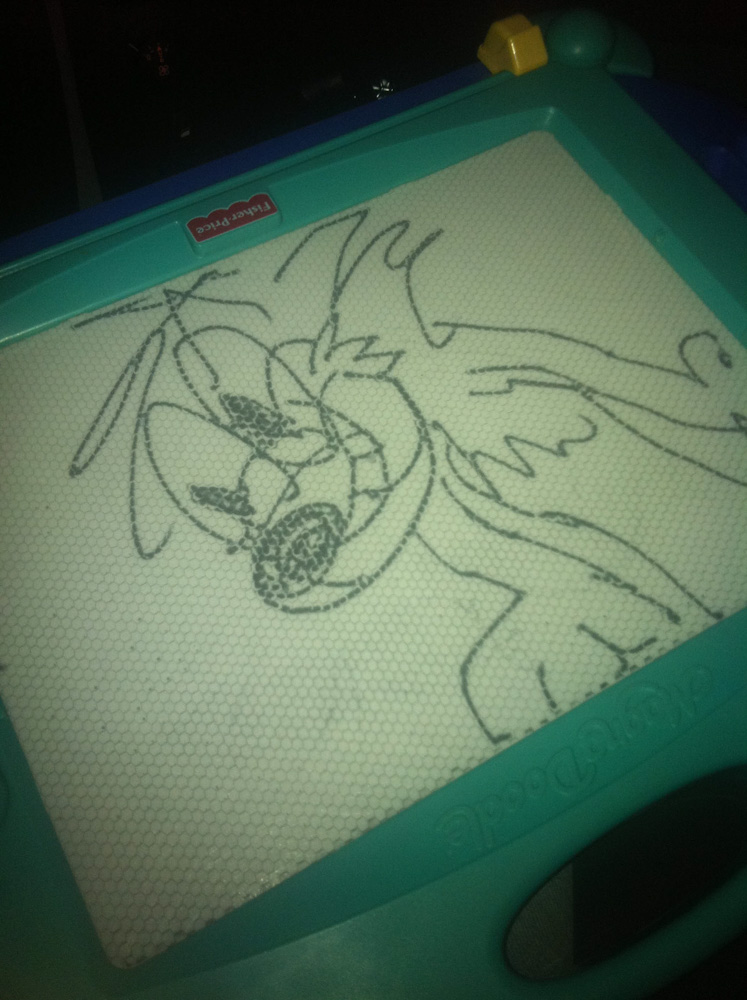 A badly drawn drawing of some toony character on an Etch-A-Sketch