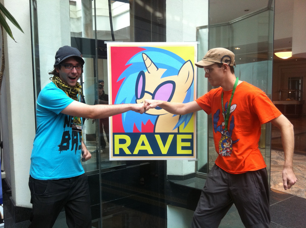 Tabbie and me doing the bro-hoof maneuver in front of a MLP poster