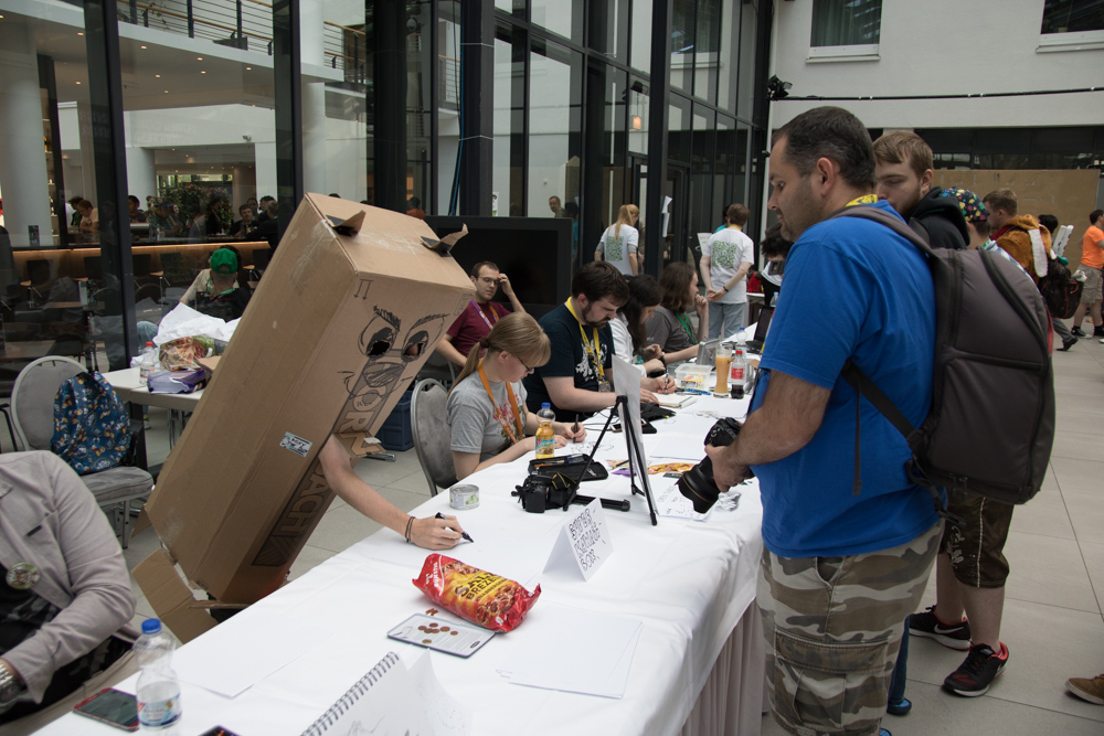 Loxy wearing a costume made out of a cardboard box with a face drawn on.