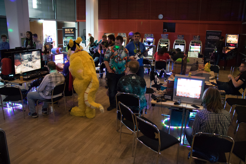 A view of the arcade with Gamecubes, guitar hero, several Astro City cabinets and much more