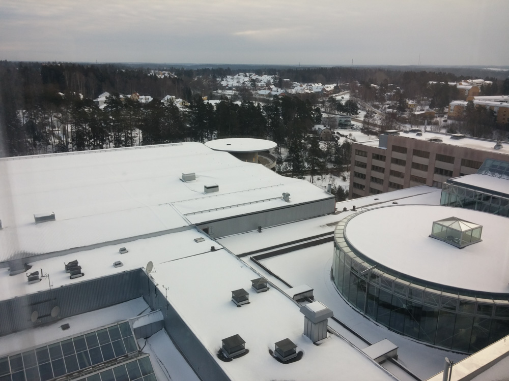 A view of the back of the hotel, covered in snow.