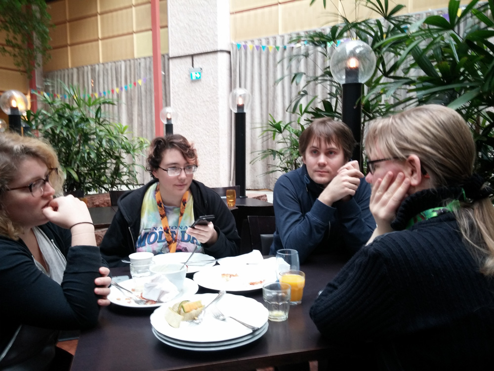 Louve, Shannon, Ekorren and Henrieke sitting at the breakfast table