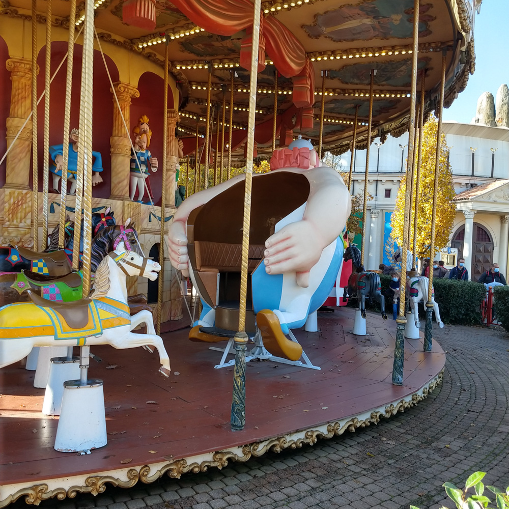 An Asterix & Obelix themed carousel with Asterix doing a goatse pose